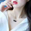 Double Swan Black Pendant